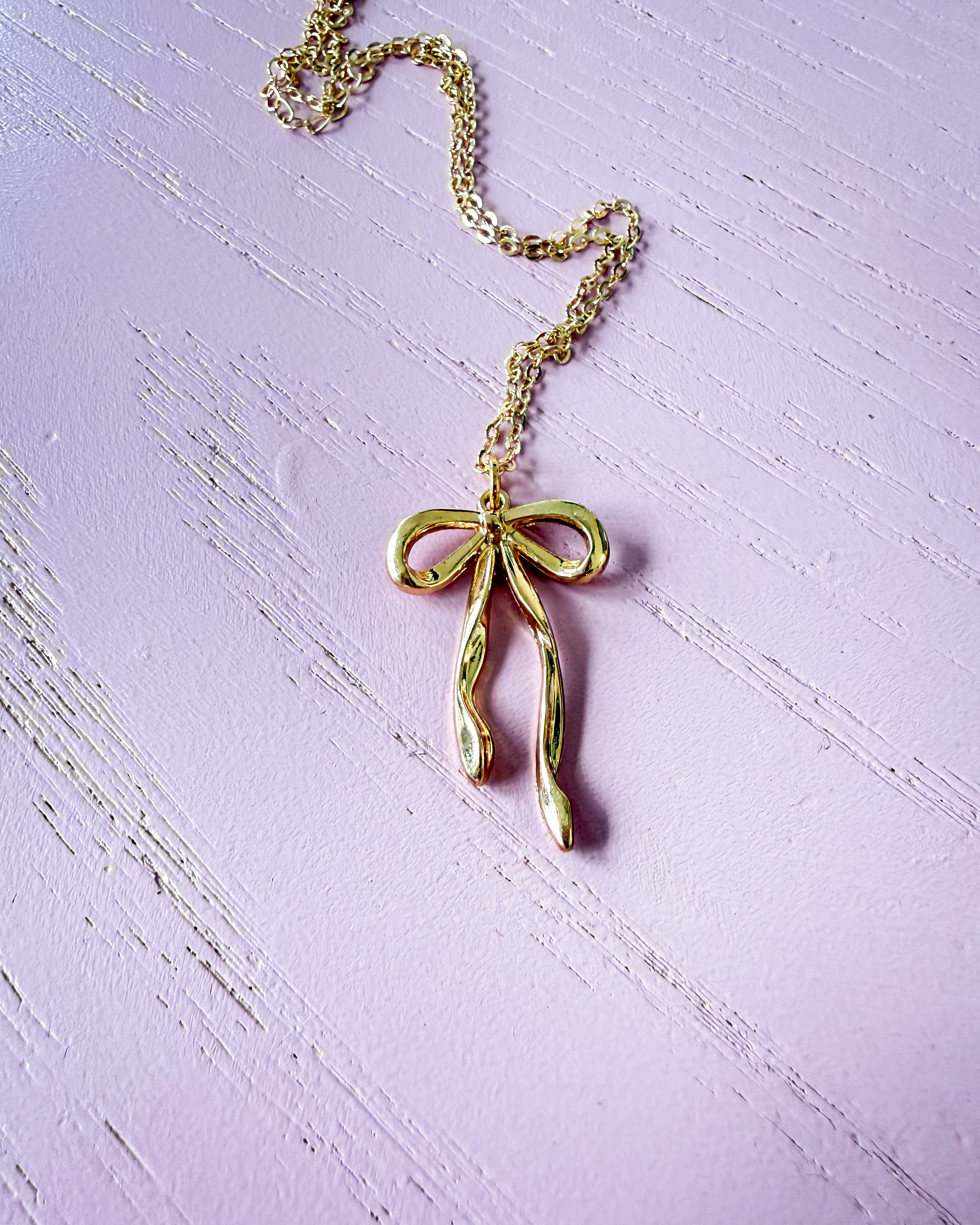 Golden Whisper Bow Necklace